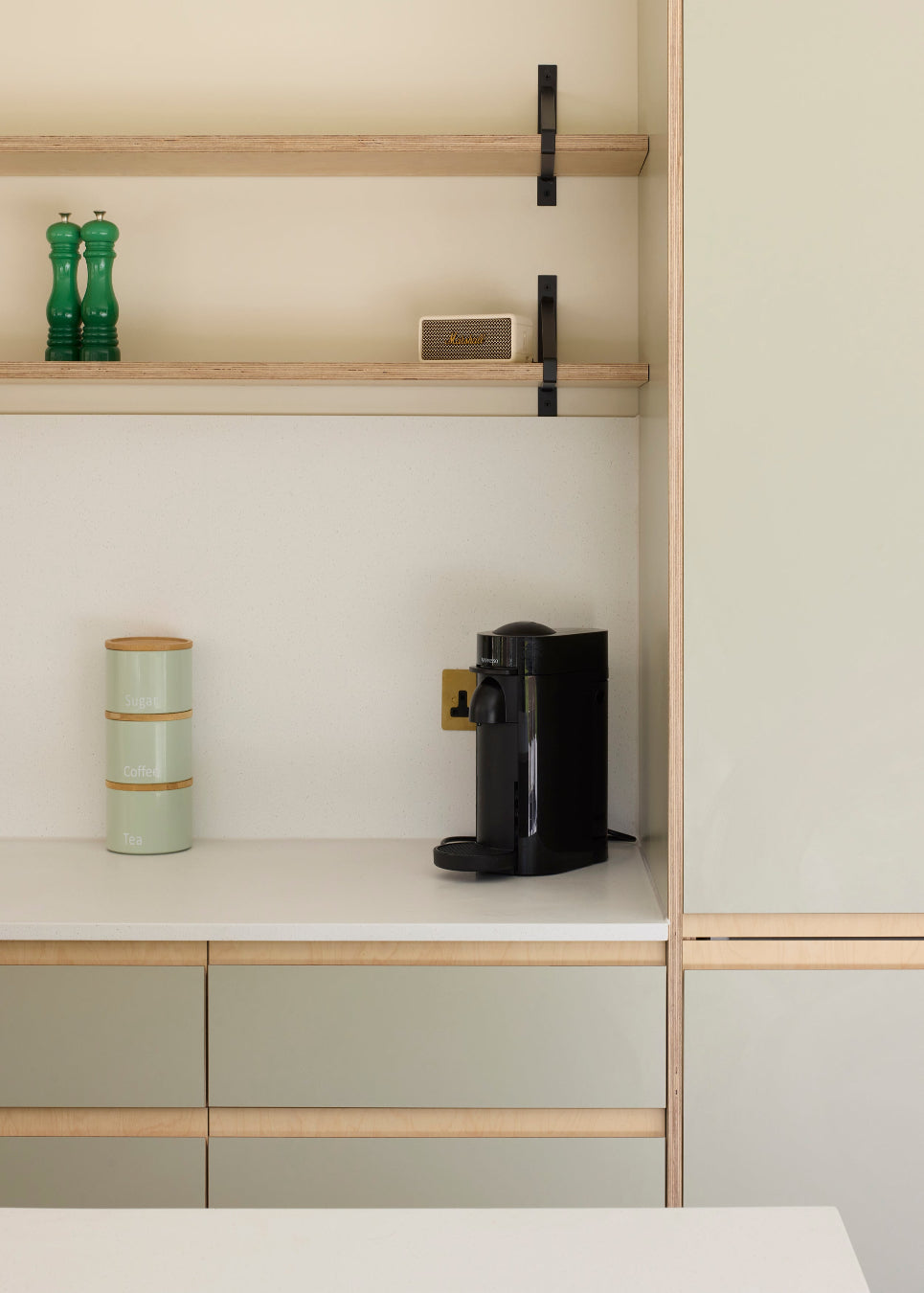 A fully custom Made in Ply kitchen. Birch plywood, Formica Seed green and bespoke plywood shelving create a warm, contemporary space with beautifully considered architectural detailing.