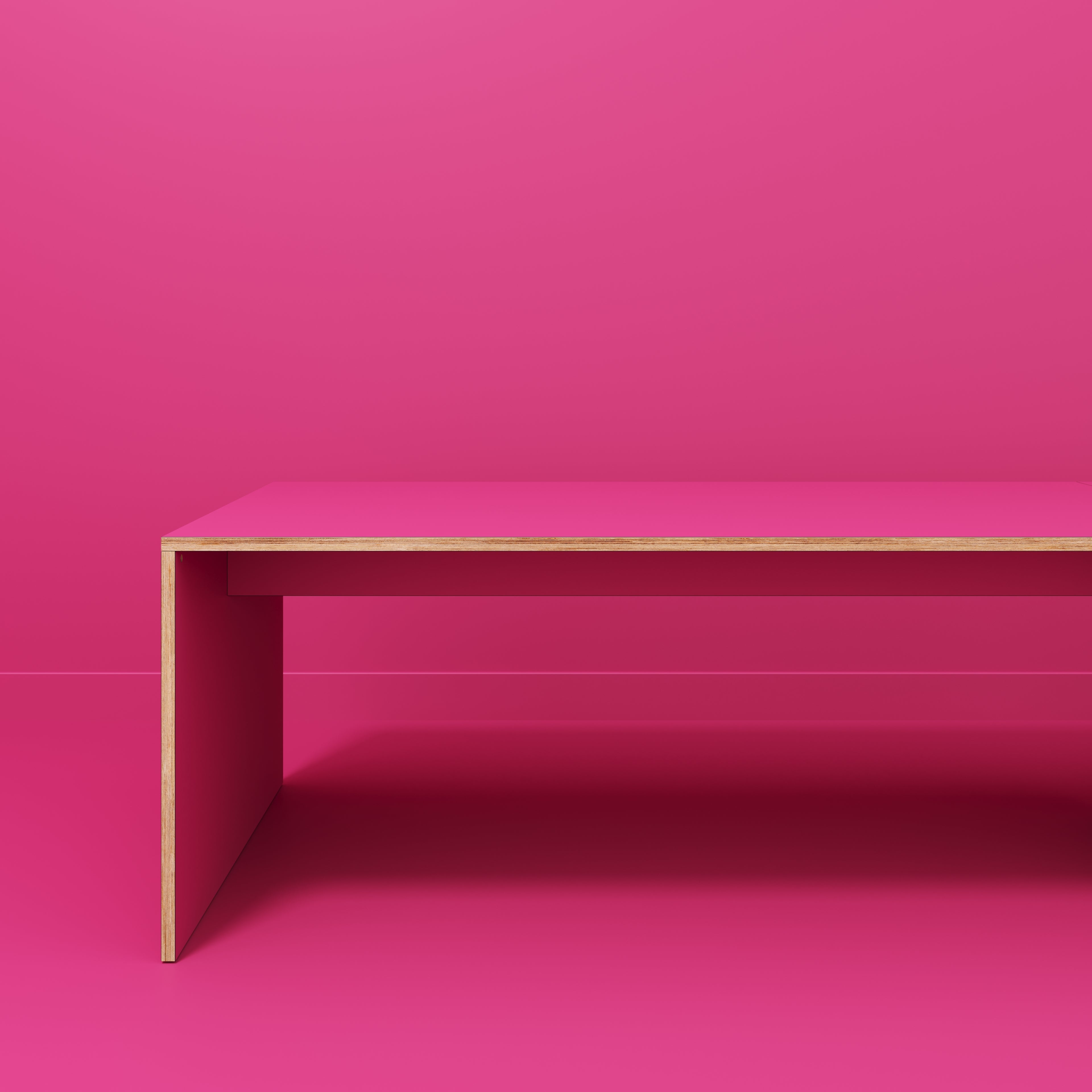 Plywood Table with Solid Sides - Formica Juicy Pink - 5600(w) x 1000(d) x 750(h)