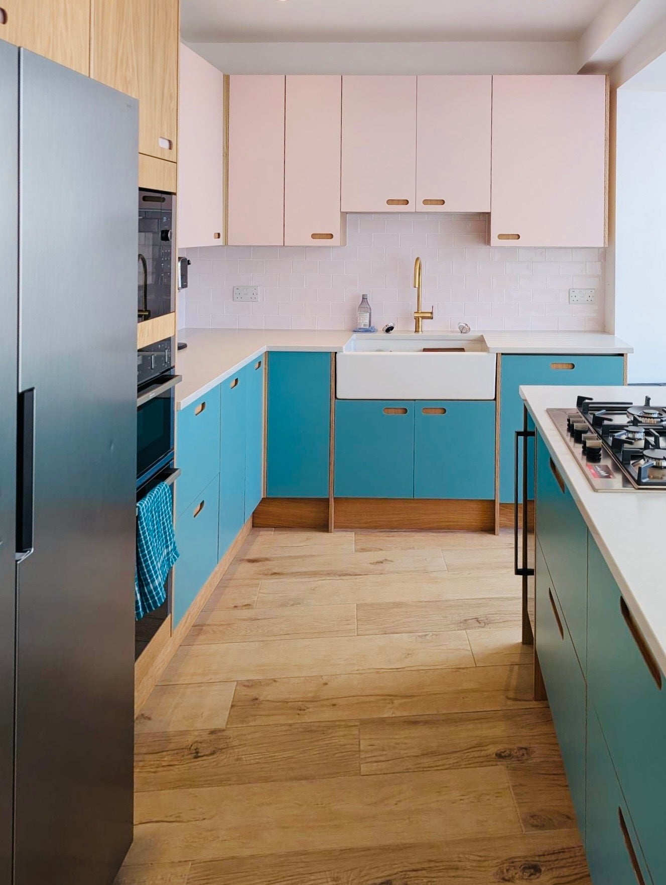 pink and blue oak plywood Howdens kitchen