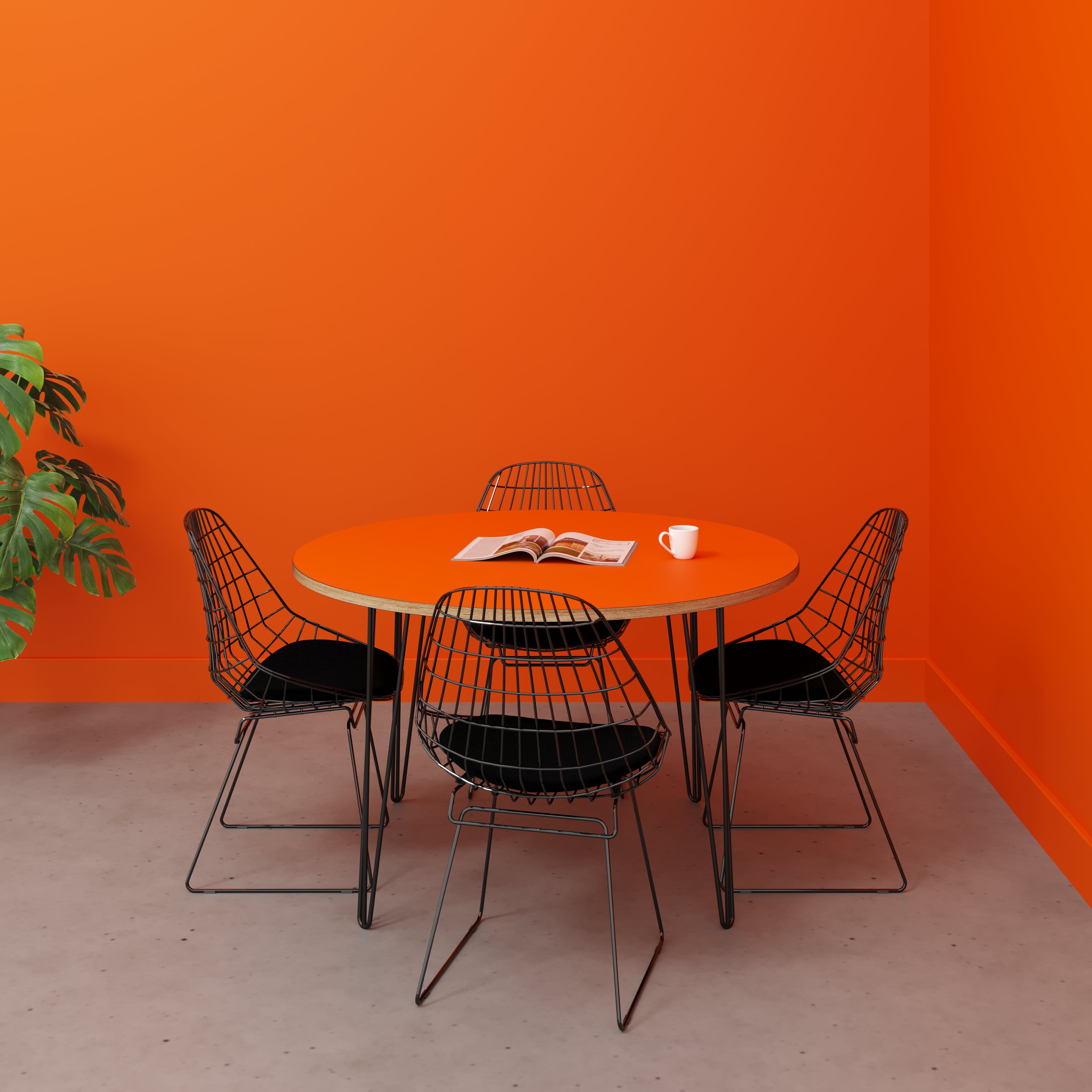 Round Table with Black Hairpin Legs - Formica Levante Orange - 1200(dia) x 735(h)