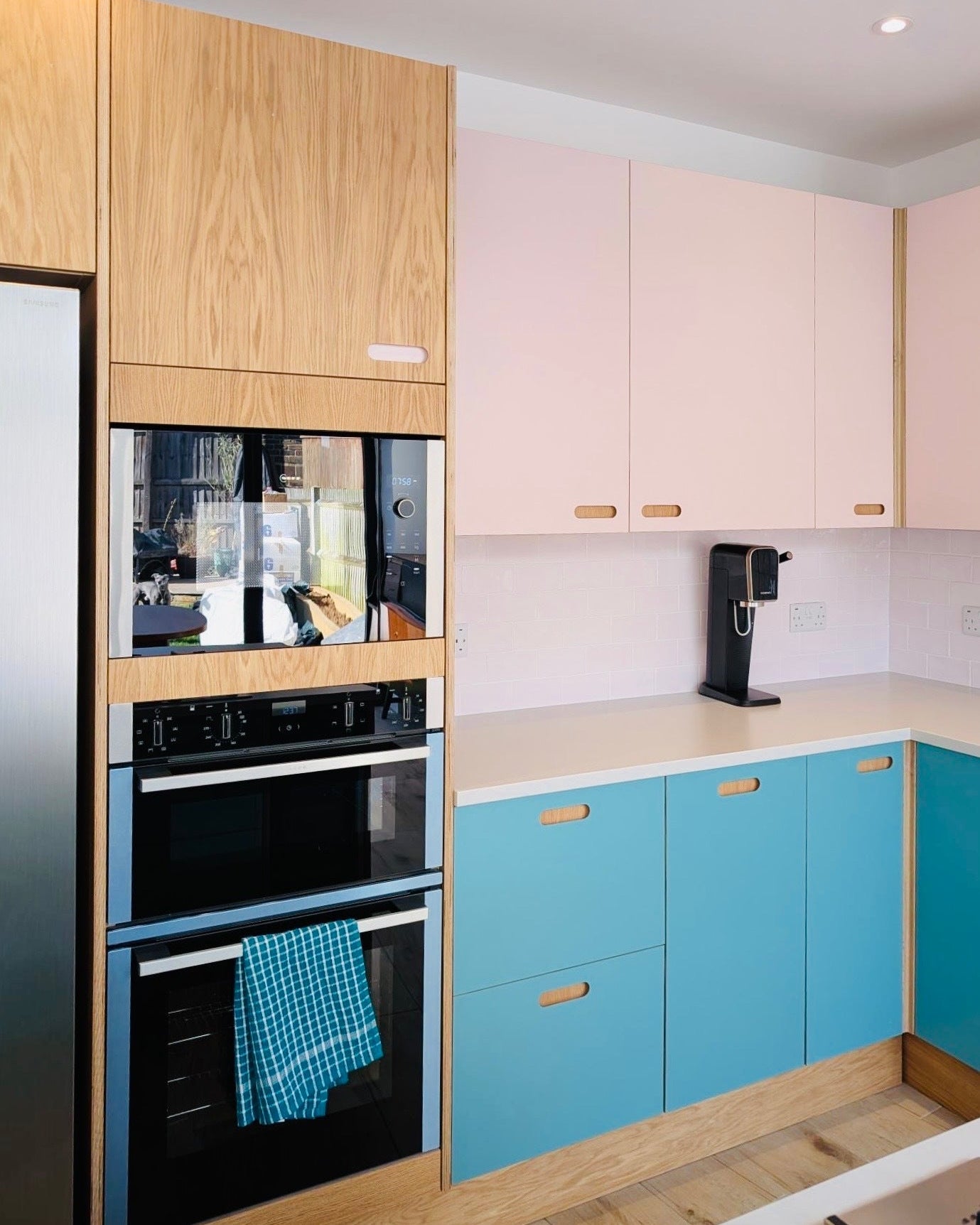 pink blue oak plywood kitchen